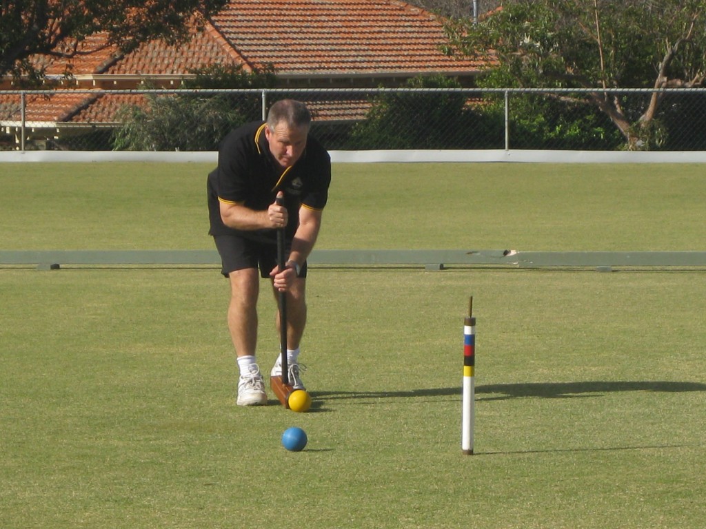 Winner Alan Sands of Como Croquet Club in action during the final game